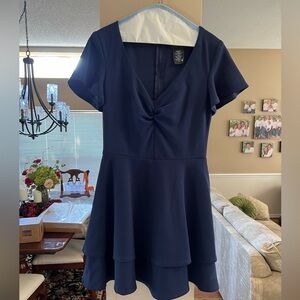 Navy blue v-neck short dress in a size 7/8.